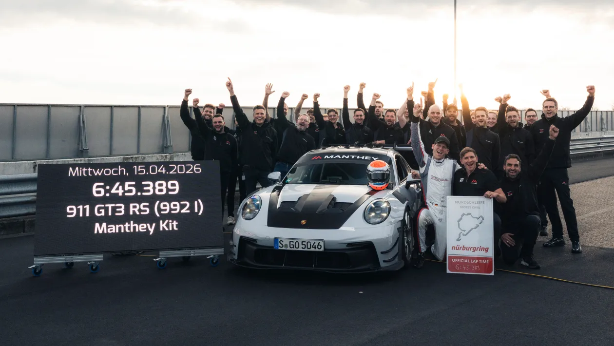 Porsche 911 GT3 RS Manthey Kit team celebrating their 6:45.389 Nurburgring lap time on April 15, 2026