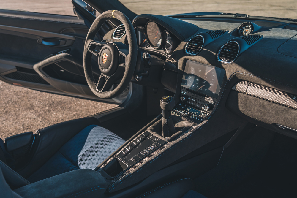 718 Cayman cockpit with manual shifter and sport steering wheel