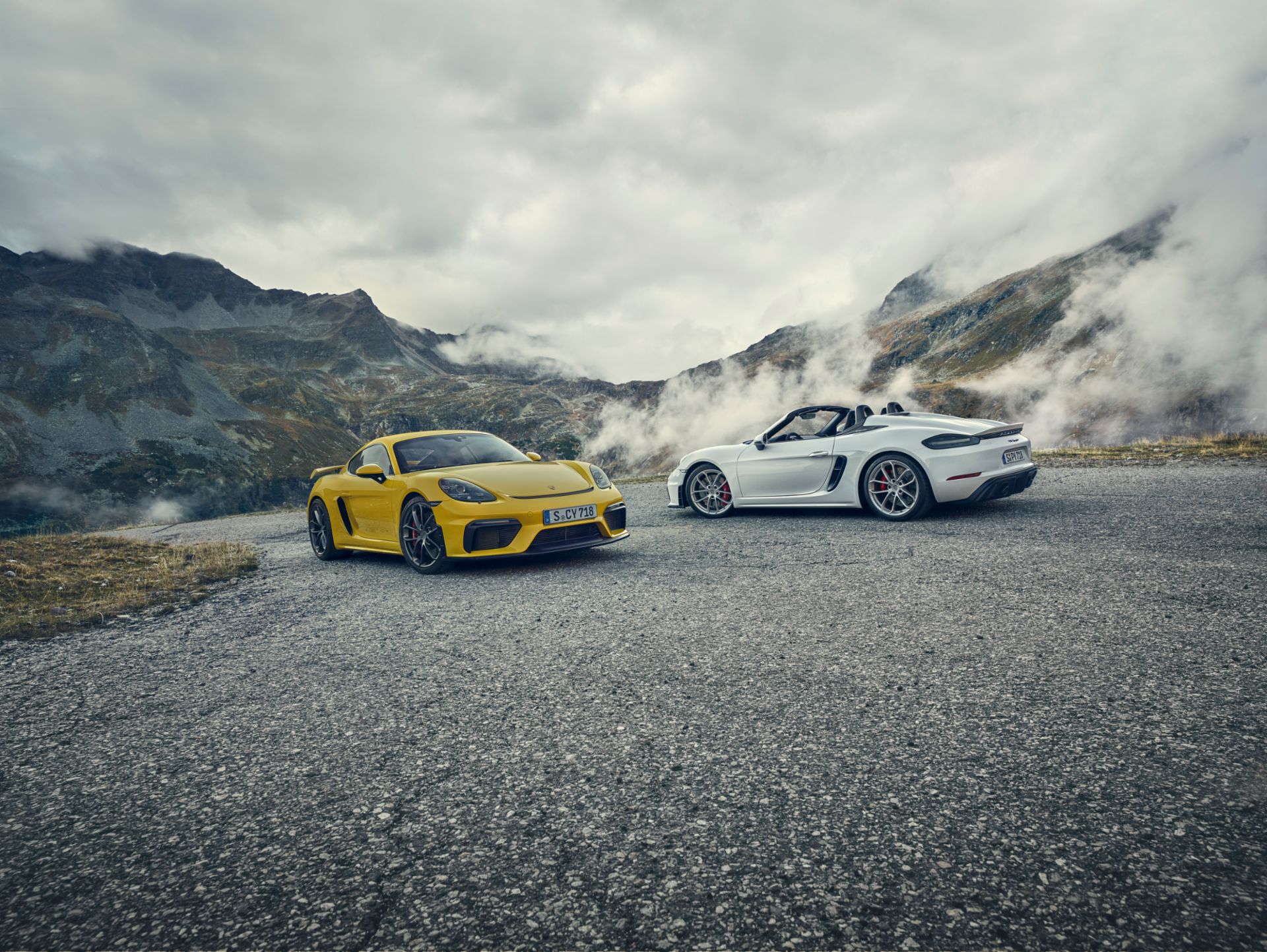 GT4 RS and Spyder RS parked side by side, rear three-quarter view